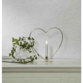 Flamme Heart Messing Fra Star Trading - Unng&aring; &aring; plassere det i direkte sollys, da vokslyset kan smelte av varmen.