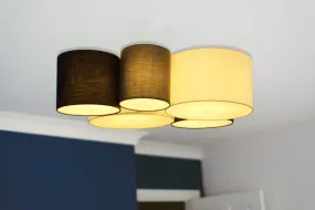 Makki 90cm Flerfarget plafond Fra Globo Lighting - Lampan har en unik design med fem cylindriska textilsk&auml;rmar i olika storlekar, varav tv&aring; &auml;r vita, tv&aring; svarta och en gr&aring;.