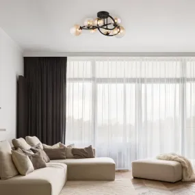 Tuberius Ø62 Rav plafond Fra Globo Lighting - Lampan &auml;r tillverkad av mattsvart metall och &auml;r smyckad med 7st glas i en&nbsp;mjuk b&auml;rnstensf&auml;rgad ton, vilket skapar en st&auml;mningsfull ljusspridning.