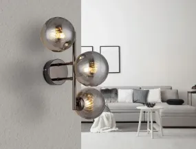 Conor 36cm Røykfarget vegglampe Fra Globo Lighting - Conor v&auml;gglampa i svart krom med r&ouml;kf&auml;rgade glassf&auml;rer ger en modern och elegant touch till vilket rum som helst.