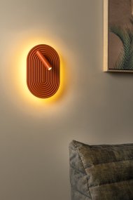 Carmino Terrakotta leselampe Fra Lucide - Carmino er en dekorativ vegglampe i en klar terrakottaskjerm som kombinerer funksjon og design.