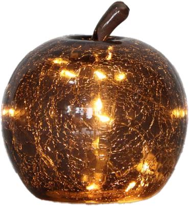 Äpple 22cm Brun bordlampe Fra Pixie Design - Den er utstyrt med en timer og en praktisk 5-trinns dimmer for &aring; justere lyset etter behov, noe som gj&oslash;r den perfekt for b&aring;de arbeidsbelysning og koselig kveldsbelysning.