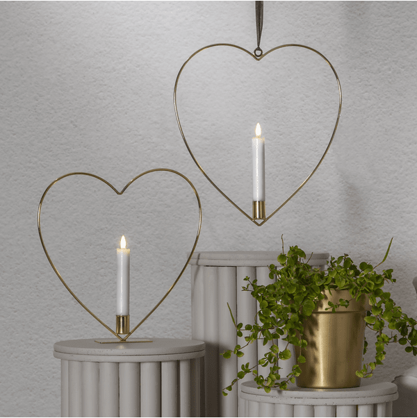 Flamme Heart Messing Fra Star Trading - Unng&aring; &aring; plassere det i direkte sollys, da vokslyset kan smelte av varmen.