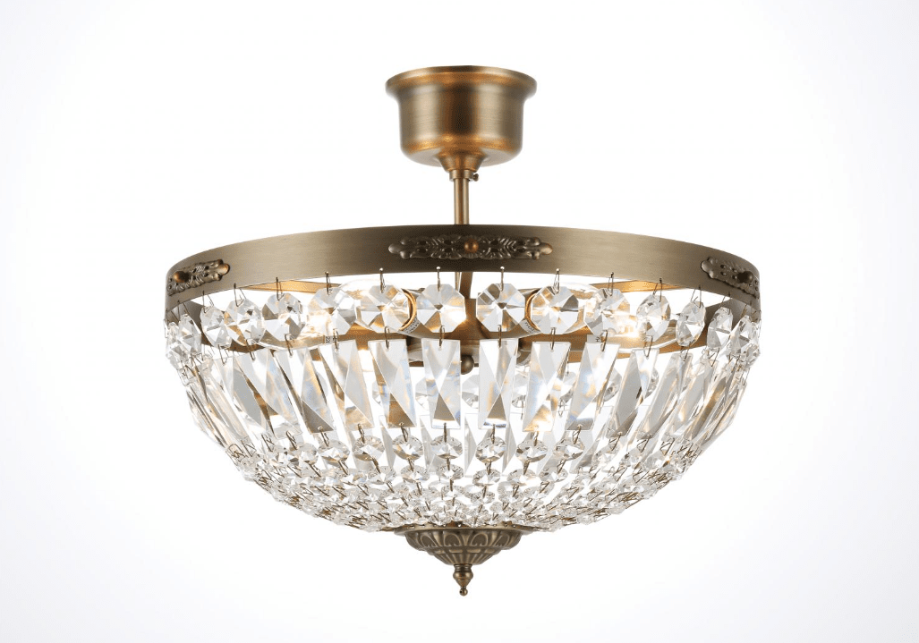 Rhea Ø40 Antikk messing krystall Fra Norrsken Design - Rhea antikke klær er en eksklusiv taklampe dekorert med prismer av håndkuttet klasse 1 K9-krystall, som gir en elegant og tidløs stil til rommet.