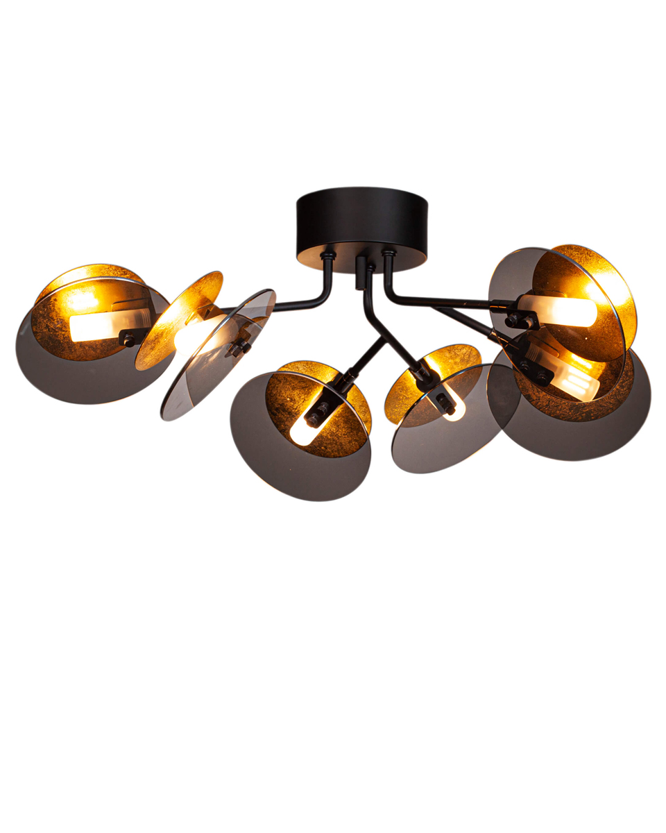 Turno 70cm Svart plafond Fra By Rydéns - D&aring; Turno plafond har ingen bakside, du kan velge om du vil at lyskildene, som er plassert i et rør av frostet glass, skal være i fokus eller om du foretrekker dem skjult og s&aring; så utstråle på sidene bak den gullfargede metallskiven.