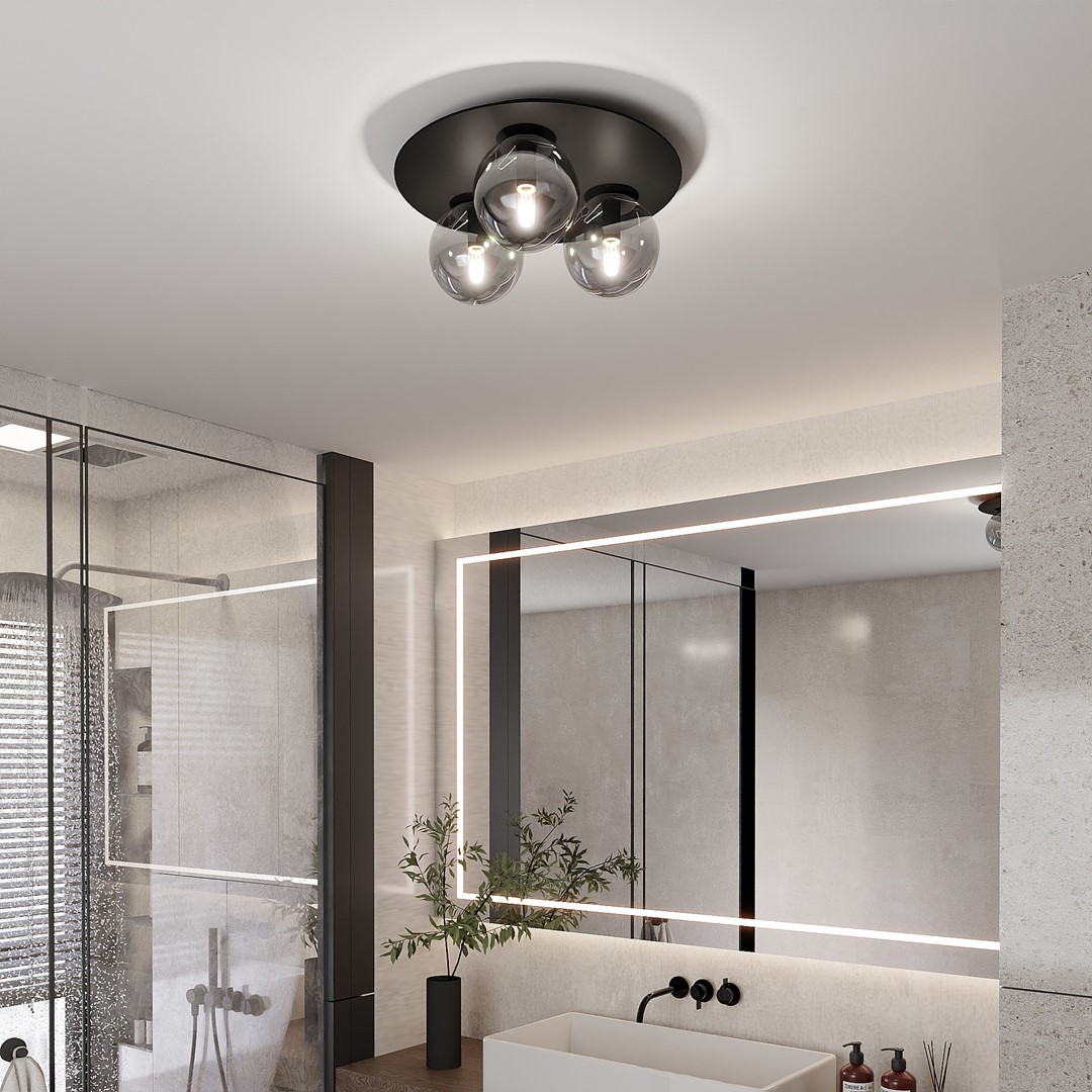 Solar Ø43 Svart plafond Fra Emibig Lighting - Den brede, svarte metallskjermen skaper et grafisk uttrykk, mens de røykfargede glasskuplene gir et mykt og behagelig lys.