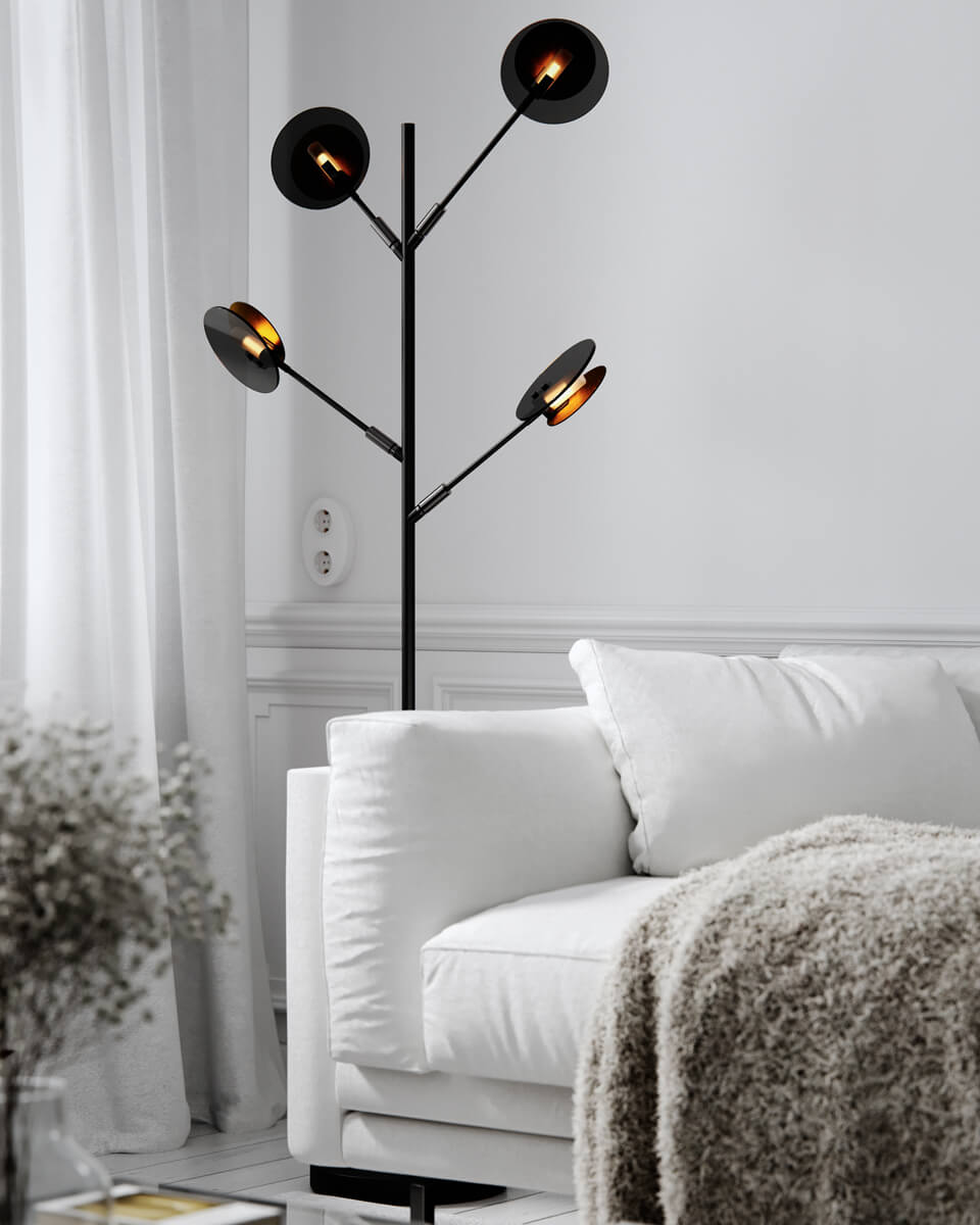 Turno Svart gulvlampe Fra By Rydéns - D&aring; Turno gulvlampe har ingen bakside, du kan velge om du vil at lyskildene, som er plassert i et r&oslash;r av frostet glass, skal v&aelig;re i fokus eller om du foretrekker dem skjult og s&aring; s&aring; utstr&aring;le p&aring; sidene bak den gullfargede metallskiven.