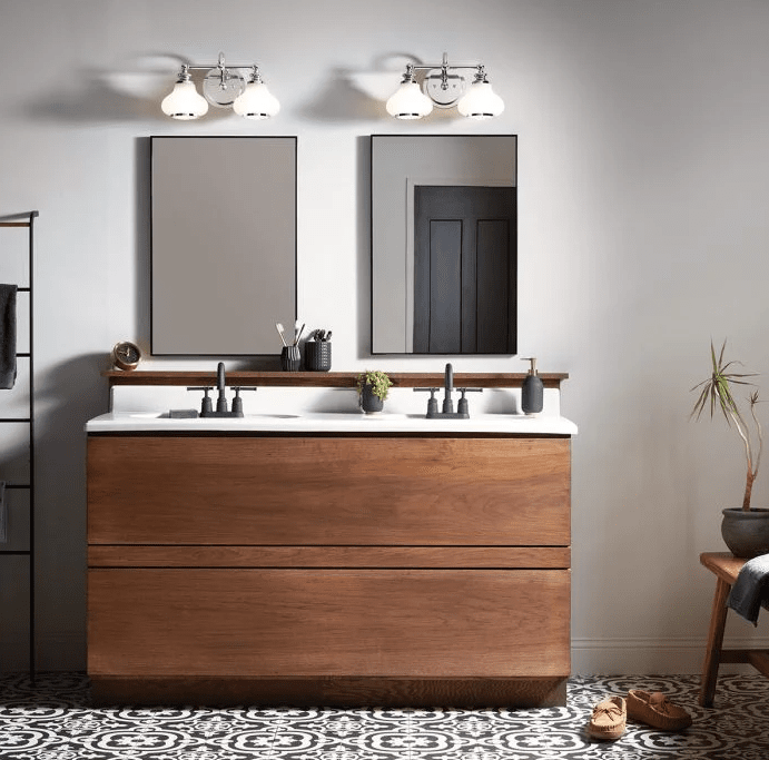 Ainsley 40cm Polert krom baderomslampe Fra Elstead Lighting - De kuppelformede opalglasskjermene gir et mykt og behagelig lys og er kombinert med elegant polert krom som setter prikken over i-en.