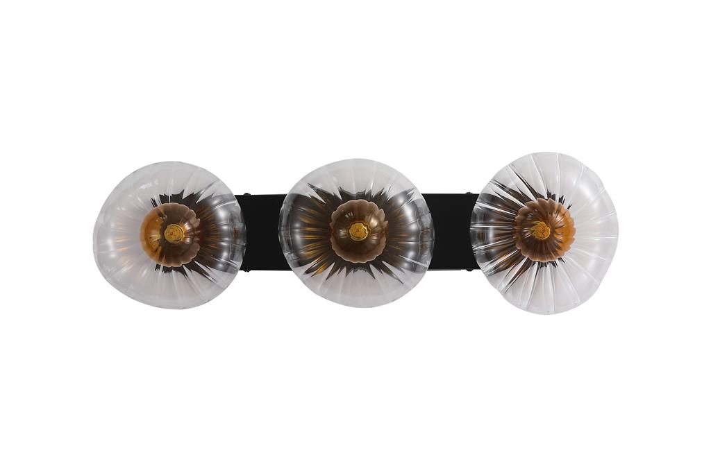 Sunbeam 52cm Gjennomsiktig/svart vegglampe Fra Searchlight - De runde, riflede skjermene i gjennomsiktig glass har en vakker ravfarget kuppel inni som skaper liv og struktur, samtidig som den sprer lyset mykt og behagelig i rommet.