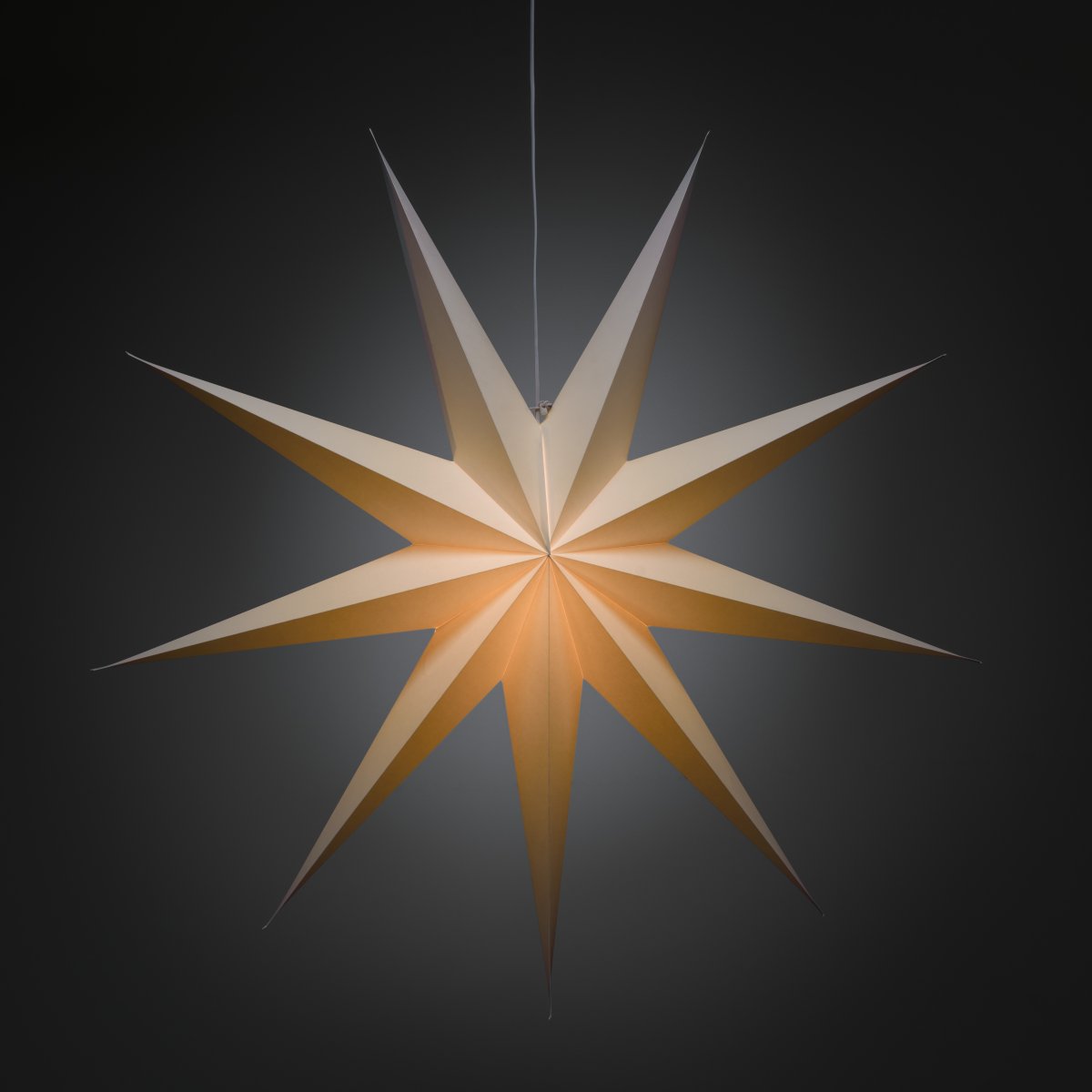 Papirstjerne Ø115 Hvit Fra Konstsmide - Perfekt &aring; henge i vinduet eller mot en vakker vegg &ndash; en tidl&oslash;s dekorasjon som forgyller hvert rom med enkel eleganse.