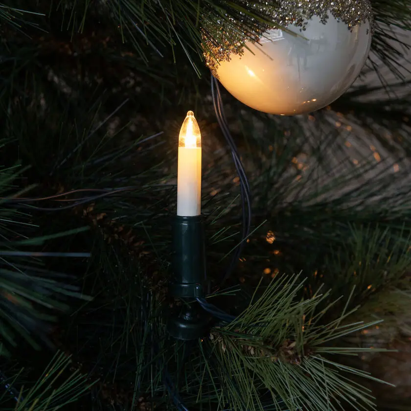 Juletrebelysning Amber 16LED 17m Grønn Fra Konstsmide - Juletrebelysning for innend&oslash;rs bruk med 16 ravfargede LED-lys som gir en varm og klassisk gl&oslash;d.