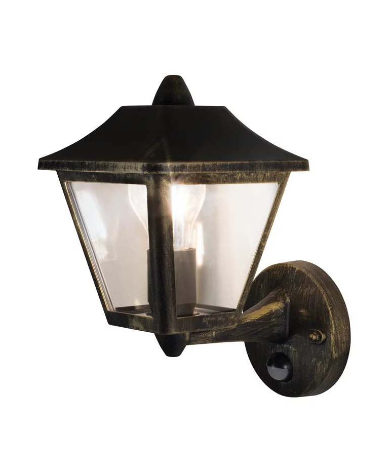 Tradition Sensor Svart/gull utendørslampe Fra Ledvance - Tradition Sensor er en stilig vegglampe i klassisk lanternedesign, perfekt for &aring; skape en innbydende atmosf&aelig;re ved innganger, innkj&oslash;rsler og fasader.