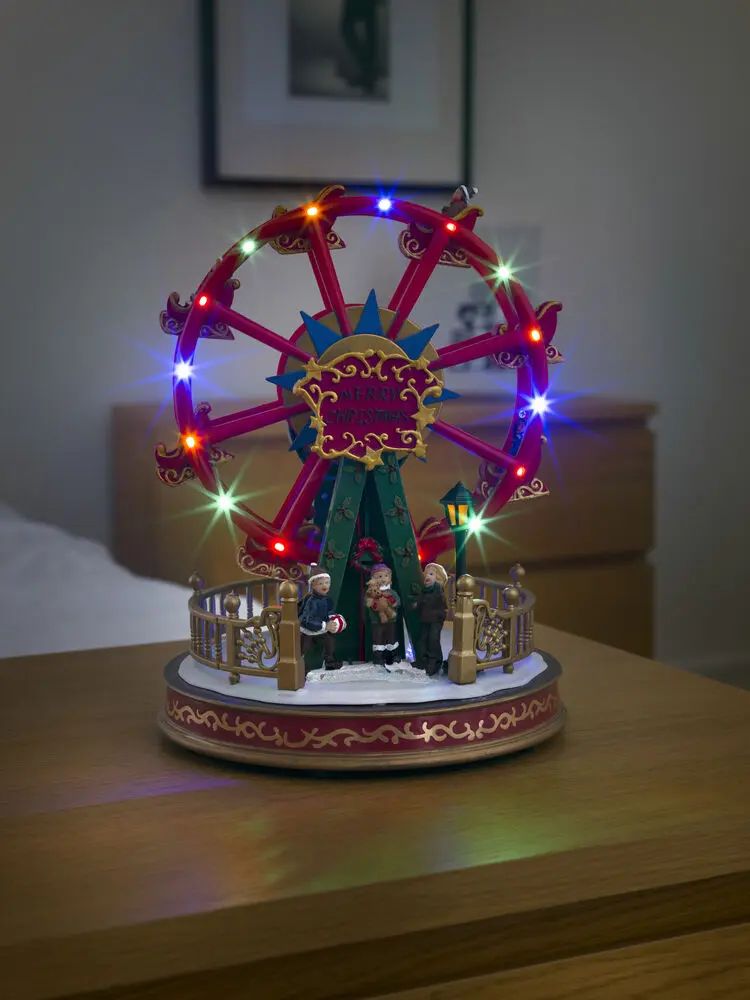 Mekanisk Juledekorasjon Med Pariserhjul 30cm Flerfarget Fra Konstsmide - Skap en magisk julef&oslash;lelse med denne sjarmerende mekaniske julepynten i form av et pariserhjul.