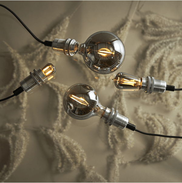 LED E14 1W 2100K Røykfarget Fra Star Trading - P&aelig;re med LED og r&oslash;ykfarget glass.