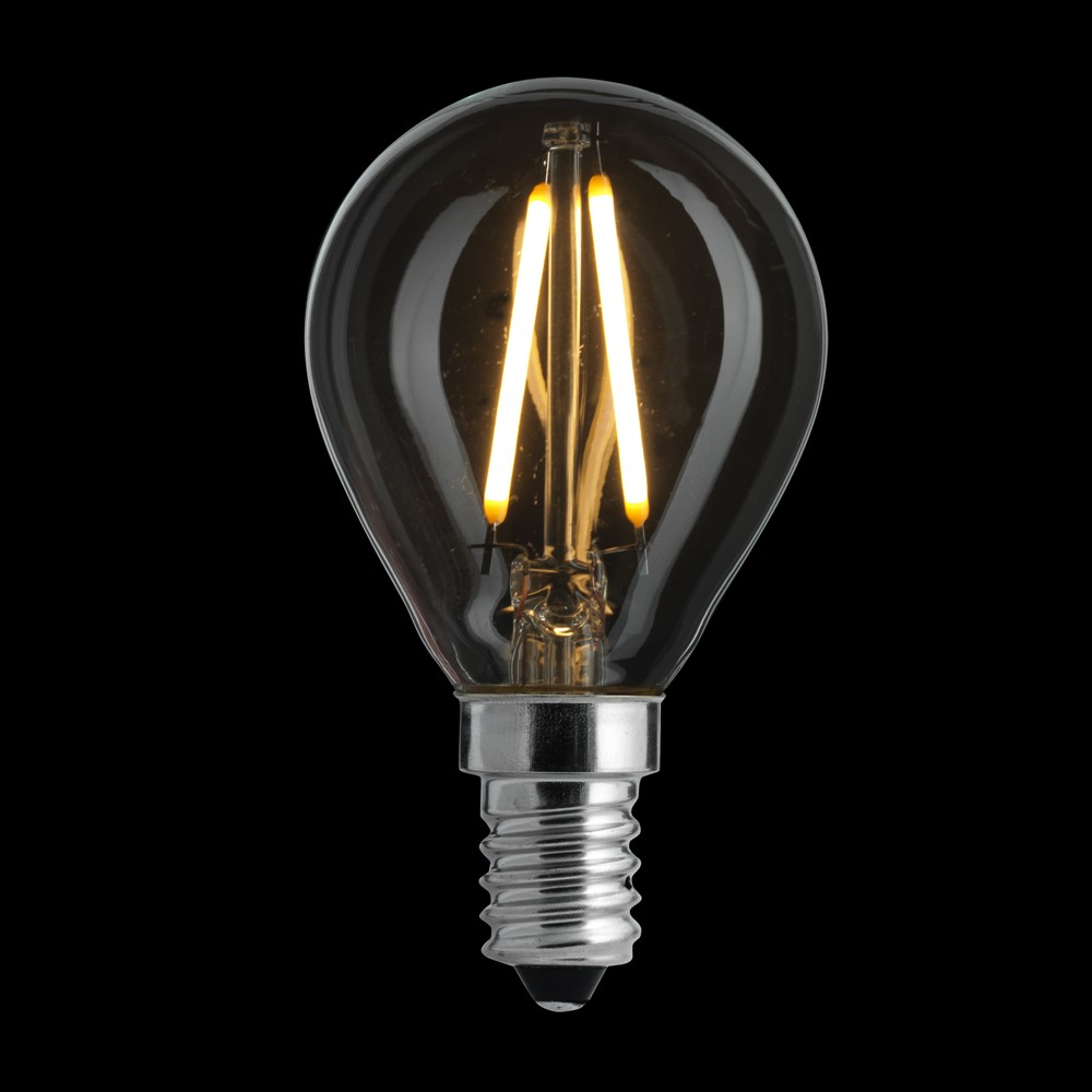 LED E14 kulepære 2W 2700K Gjennomsiktig Fra Unison - Med kun 2W effekt og et mykt, varmt lys p&aring; 2700K er den b&aring;de energieffektiv og perfekt for &aring; skape en hyggelig atmosf&aelig;re i mindre lamper eller dekorative installasjoner.
