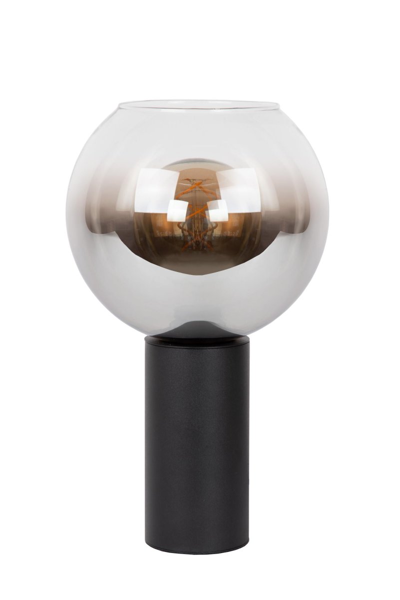 Marius 32cm Svart bordlampe Fra Lucide - Med en kompakt sylindrisk sokkel av metall og lampeskjerm i røkt glass klarer Marius seg like godt med; brystet, skrivebordet, salongbordet eller nattbordet.