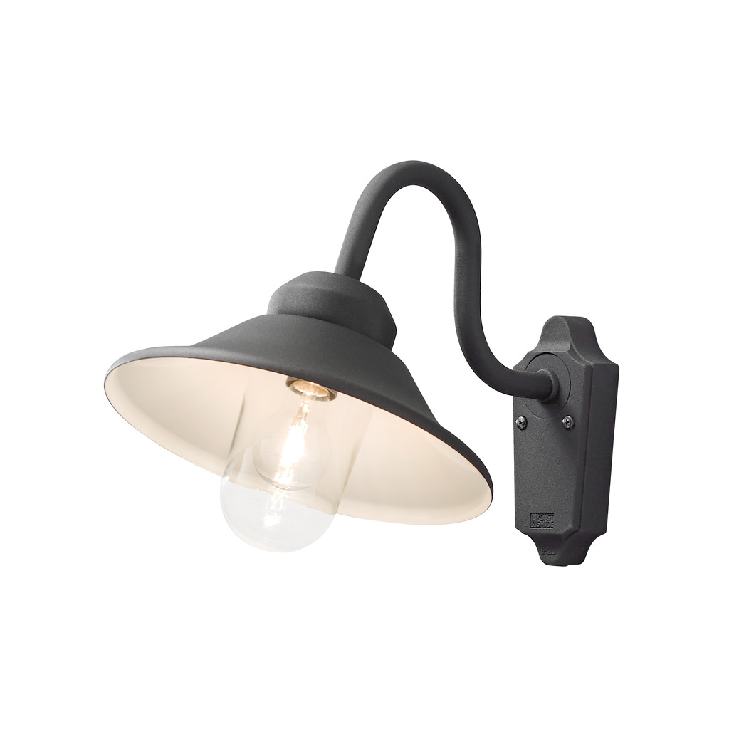 Vega Svart utendørslampe Fra Konstsmide - Med sin klassiske form og store skygge skaper den et behagelig og rettet lys, perfekt for entréer og uteplasser.