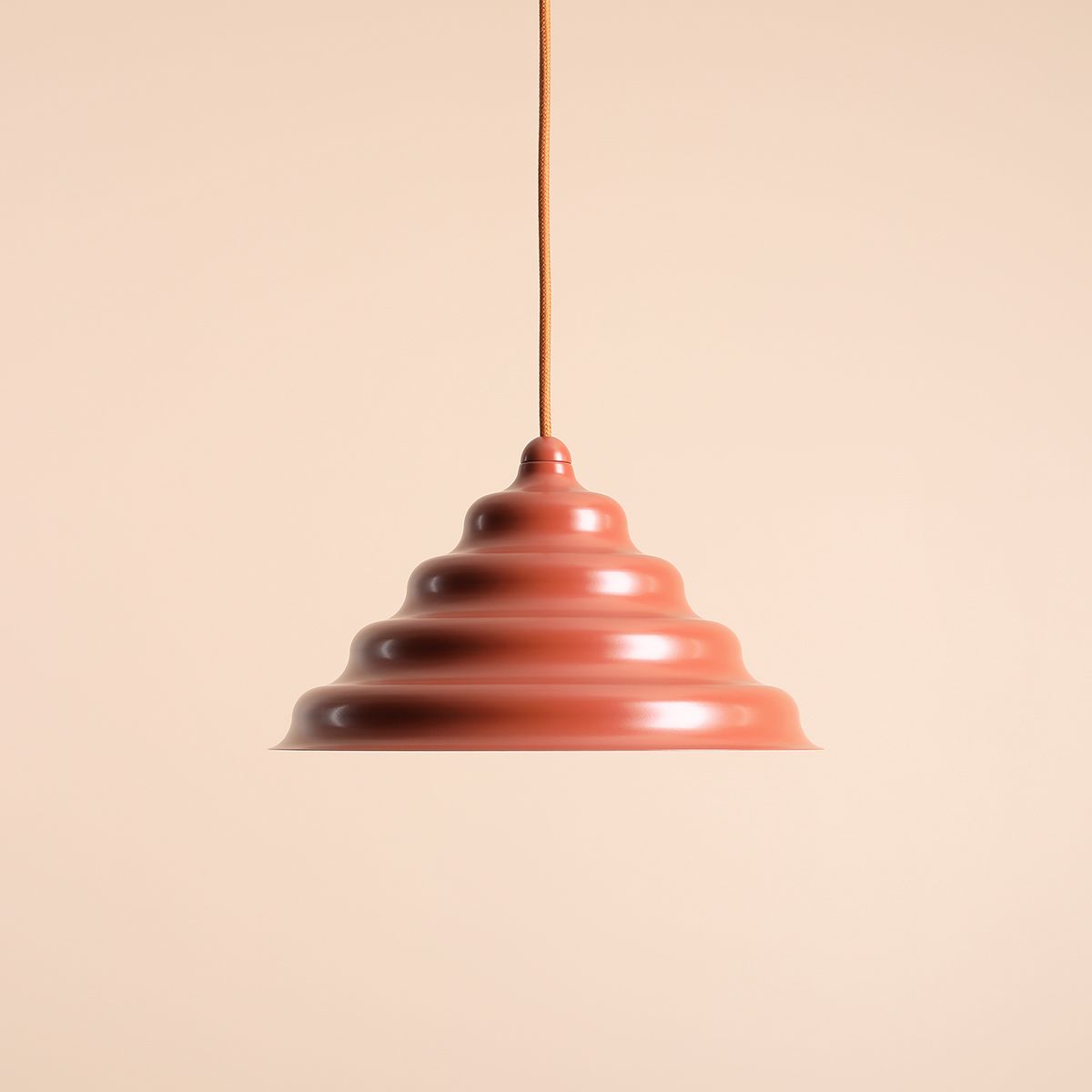 Wave Ø30 Oransje Taklampe Fra Artera - Den solide skyggen av metall i en rødbrun farge gir en fin spredning av lys nedover, noe som gjør den perfekt å henge over spisebordet eller kjøkkenet.