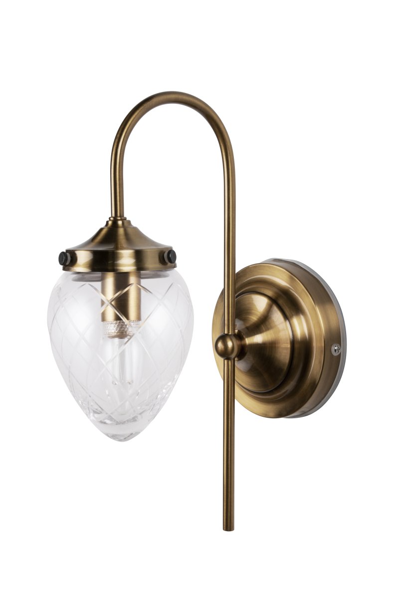 Juni 24cm Antikk messing/gjennomsiktig baderomslampe Fra Globen Lighting - Lampen er perfekt for badet eller kjøkkenet, der den er IP44-klassifisert.