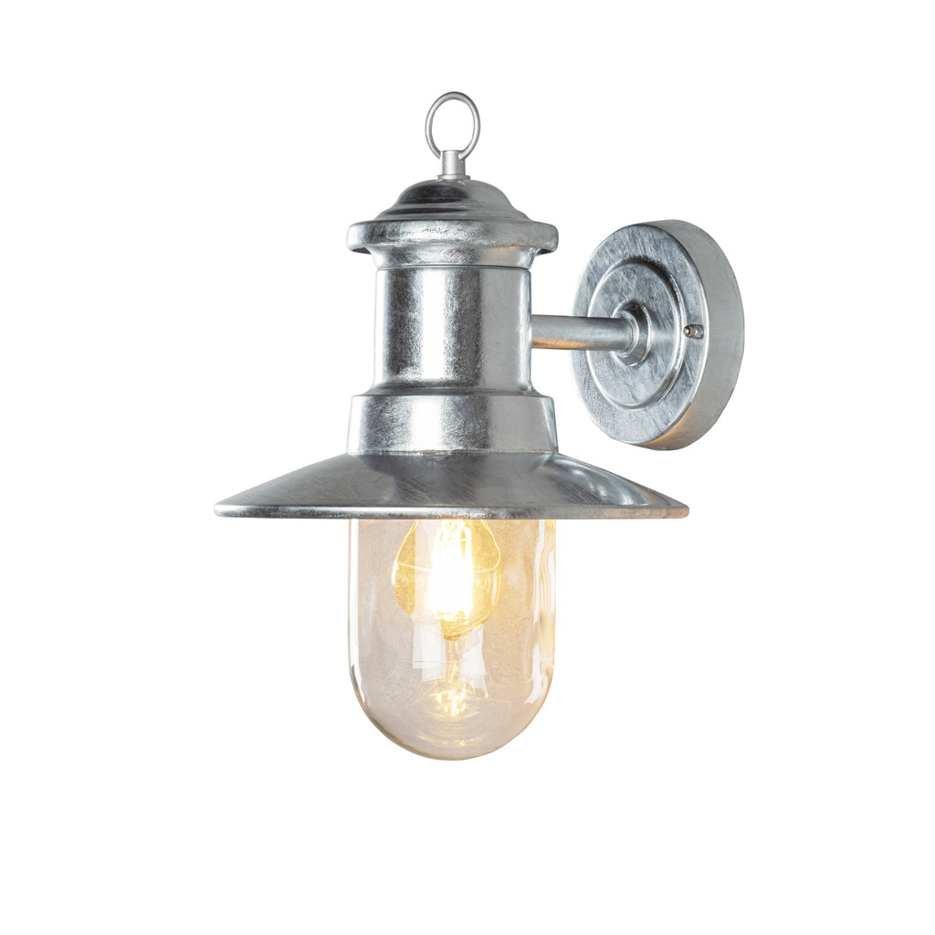 Napoli Varmgalvanisert utendørslampe Fra Konstsmide - Lampens klassiske design med rund glasskuppel og bred skjerm sprer et varmt og behagelig lys, perfekt for å lyse opp innganger og uteplasser.