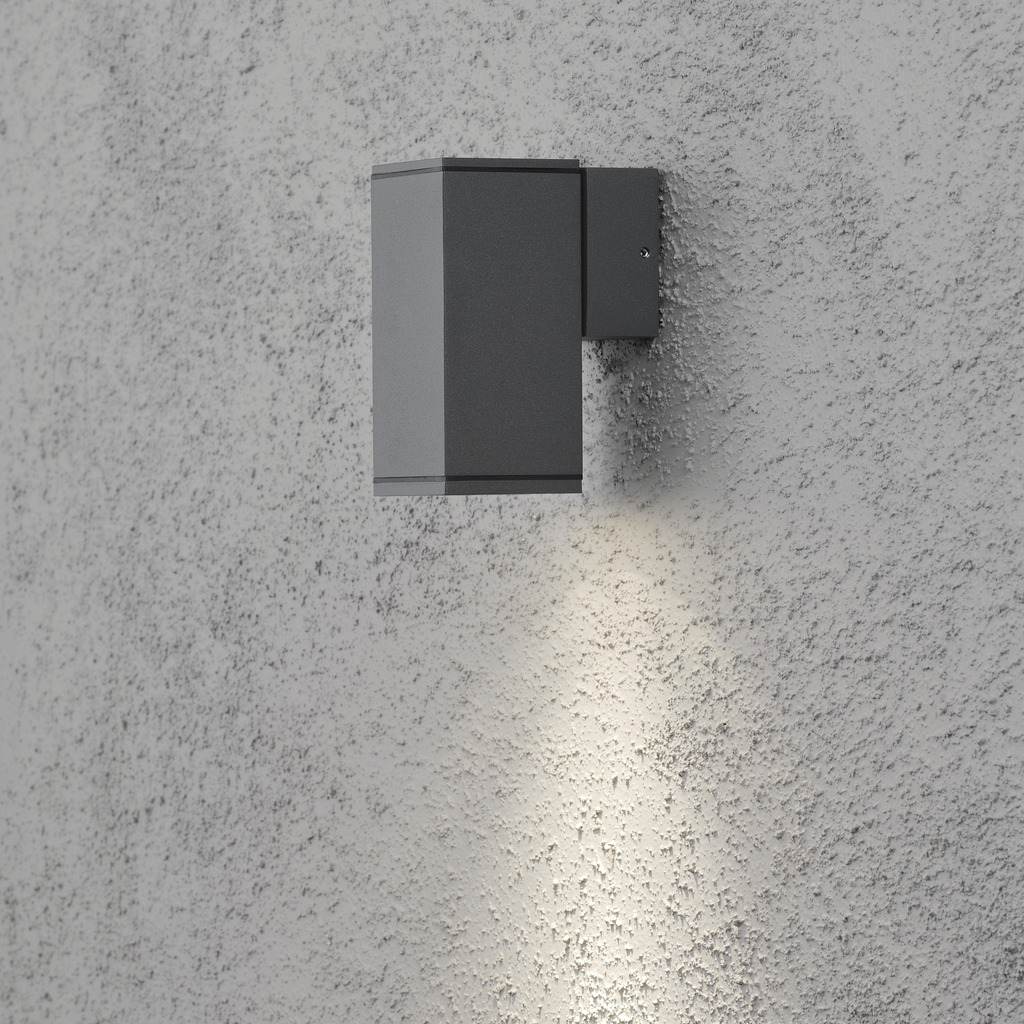 Monza Mørk grå utendørslampe Fra Konstsmide - Med sin kubeformede design og direkte lys er den ideell for å skape en sofistikert atmosfære i innganger og ganger.