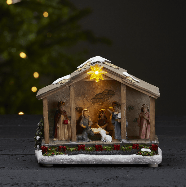 Nativity Flerfarget Fra Star Trading - Plasser den på et bord eller en hylle for en herlig julestemning.