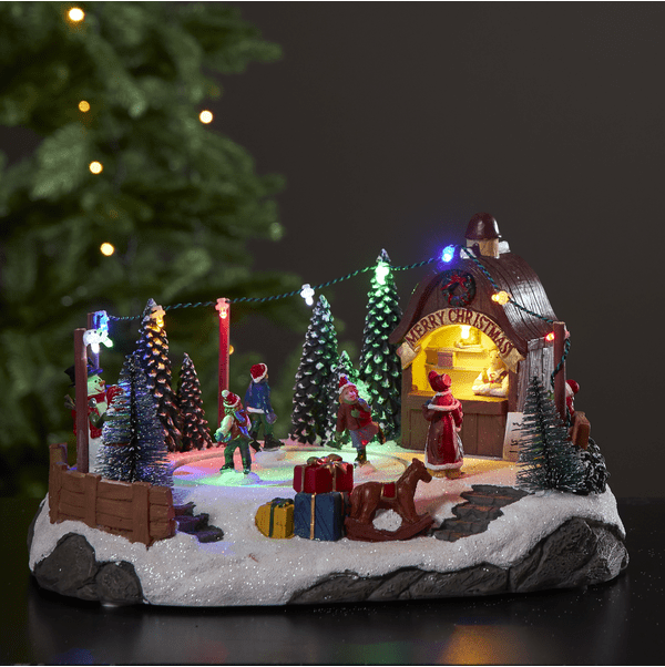 Iceville Flerfarget Fra Star Trading - Fantastisk dekorasjon til jul eller advent med en liten skøytebane som roterer og spiller musikk.