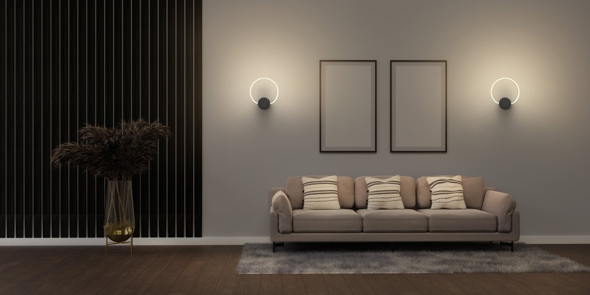 Aura Ø37 Svart vegglampe Fra Ledvance - Lampan har tv&aring; olika belysningspunkter med integrerad LED, en bakom v&auml;ggplattan och cirkeln.