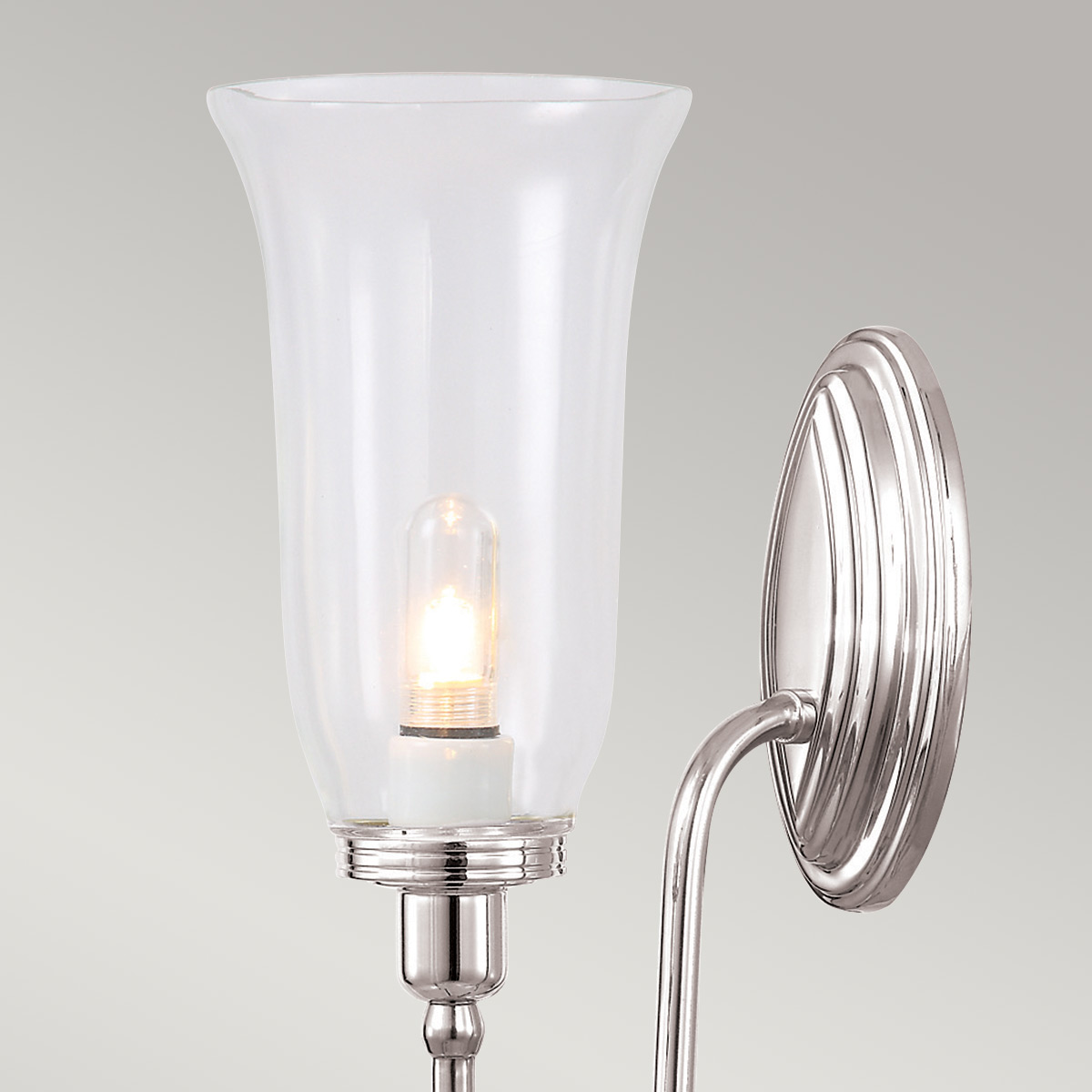Blake 34cm Polert nikkel baderomslampe Fra Elstead Lighting - Lampen finnes i flere ulike stiler og glassdesign, og tilbys med overflater i polert krom, polert nikkel og polert messing.