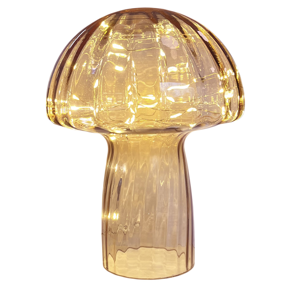 Mushroom 23cm Beige bordlampe Fra Pixie Design - Den er utstyrt med timer og en praktisk 5-trinns dimmer for &aring; justere lyset etter behov, noe som gj&oslash;r den perfekt for b&aring;de arbeidsbelysning og koselig kveldsbelysning.
