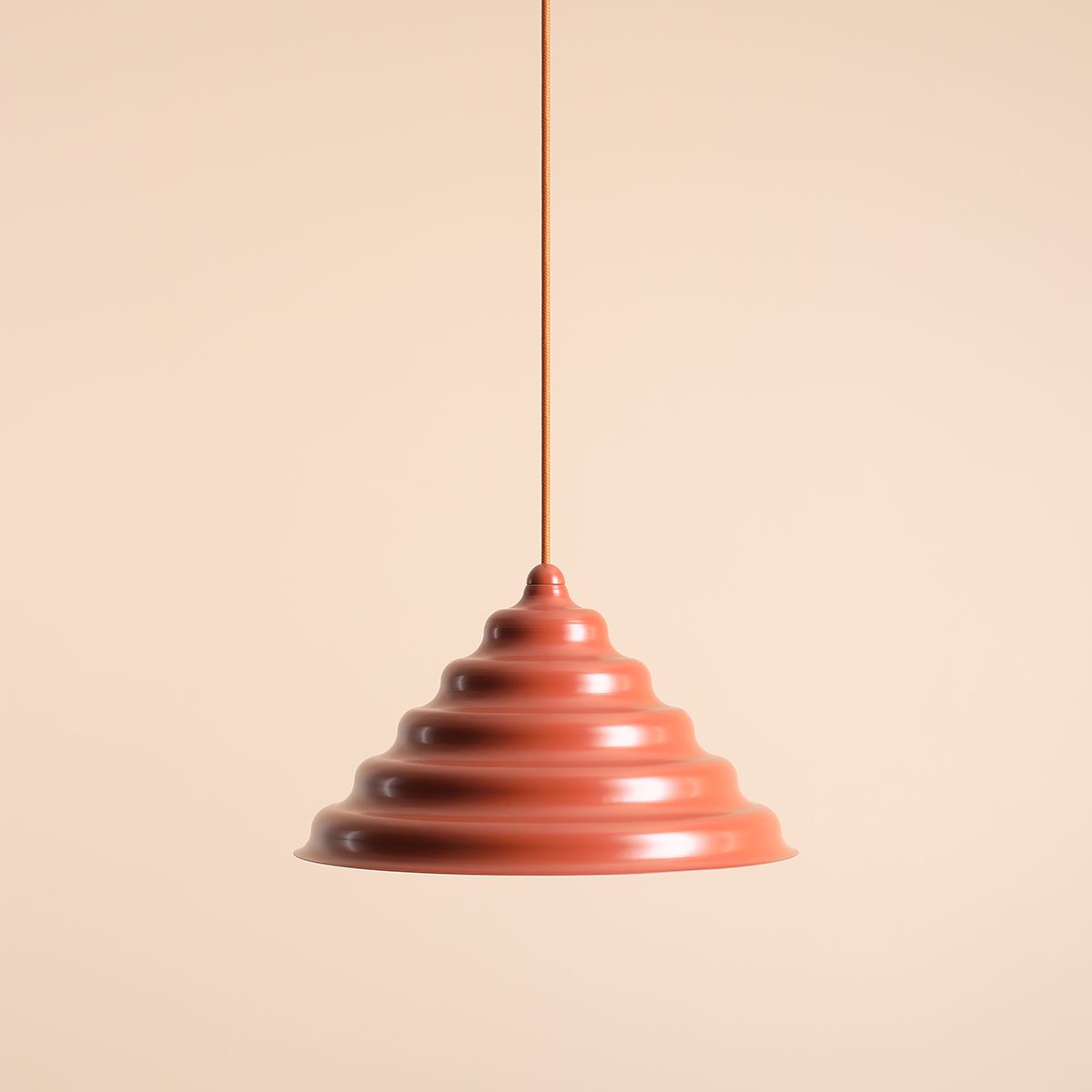 Wave Ø36 Oransje Taklampe Fra Artera - Den solide skyggen av metall i en rødbrun farge gir en fin spredning av lys nedover, noe som gjør den perfekt å henge over spisebordet eller kjøkkenet.