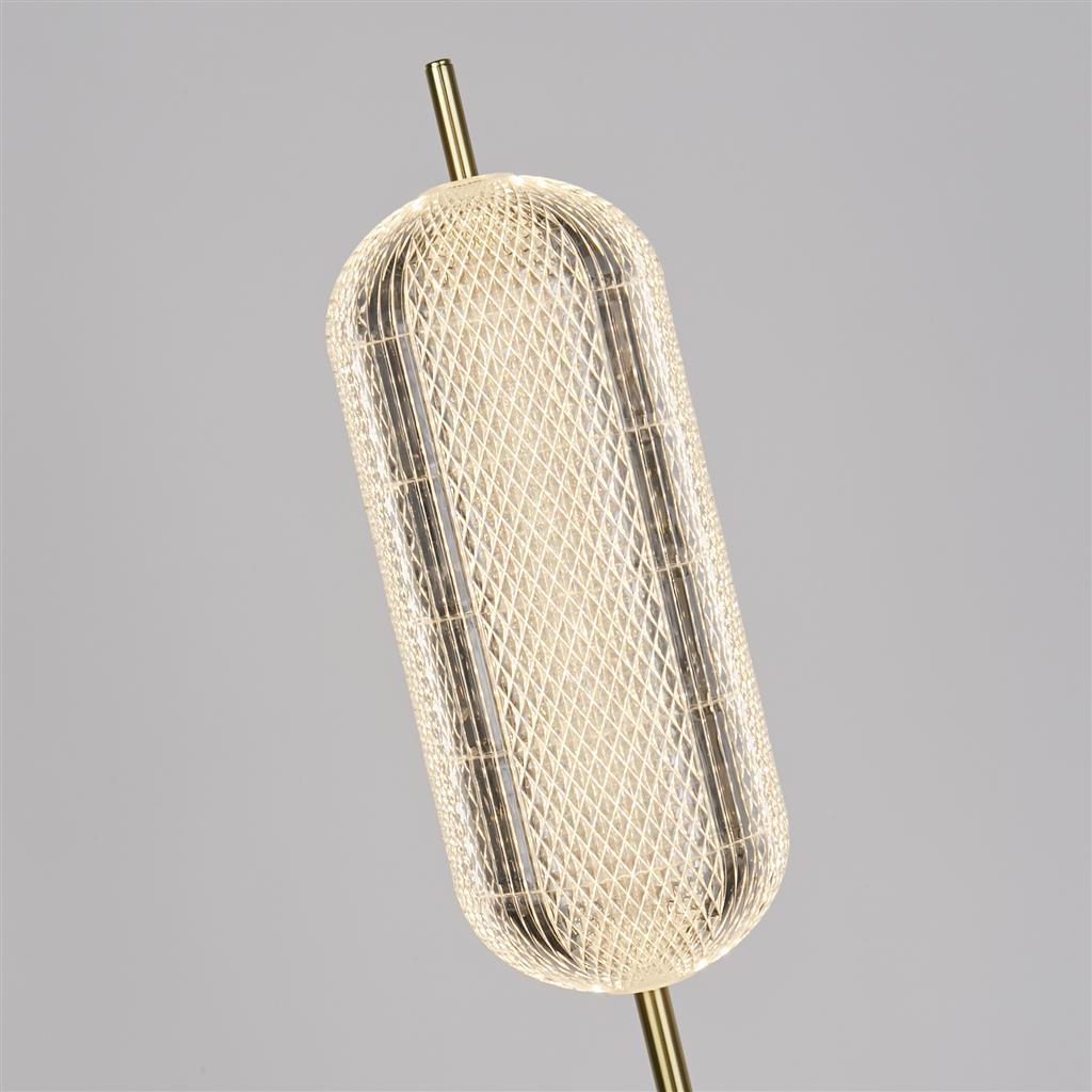 Capsule Messing gulvlampe Fra Searchlight - Capsule er en elegant og moderne gulvlampe med detaljer i satengmessing og en skjerm i akrylglass som sprer et mykt og behagelig lys.