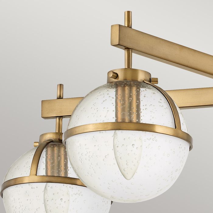 Hollis Ø80 Antikk messing/gjennomsiktig baderomslampe Fra Elstead Lighting - Hollis er en dekorativ taklampe for badet med et distinkt vintage-preg og inspirasjon fra midten av 1900-tallet.