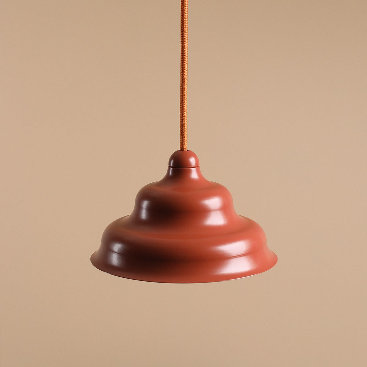 Wave Ø17 Oransje Taklampe Fra Artera - Den solide skyggen av metall i en r&oslash;dbrun farge gir en fin spredning av lys nedover, noe som gj&oslash;r den perfekt &aring; henge over spisebordet eller kj&oslash;kkenet.