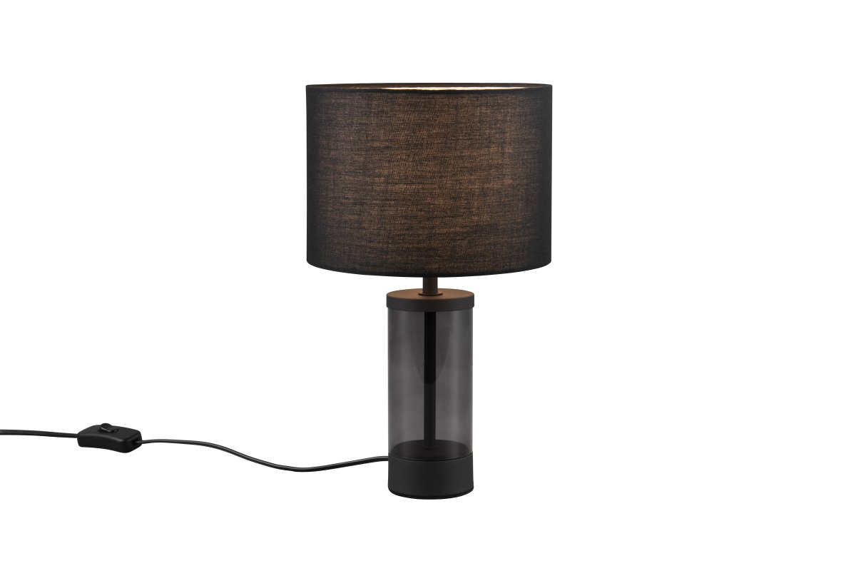 Grazia 34cm Svart bordlampe Fra Trio Lighting - Bordlampen Grazia kombinerer en elegant stoffskjerm med en stilig sylindrisk fot i glass og metall, som gir et harmonisk og sofistikert inntrykk.