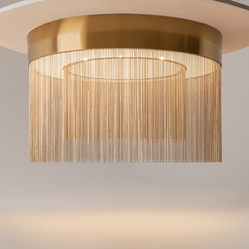 Imaginary Ø55 Gull plafond Fra Maytoni - Imaginary er en elegant taklampe i metall med en luksuri&oslash;s gullfinish og dekorative kjededetaljer som skaper et mykt og eksklusivt inntrykk.