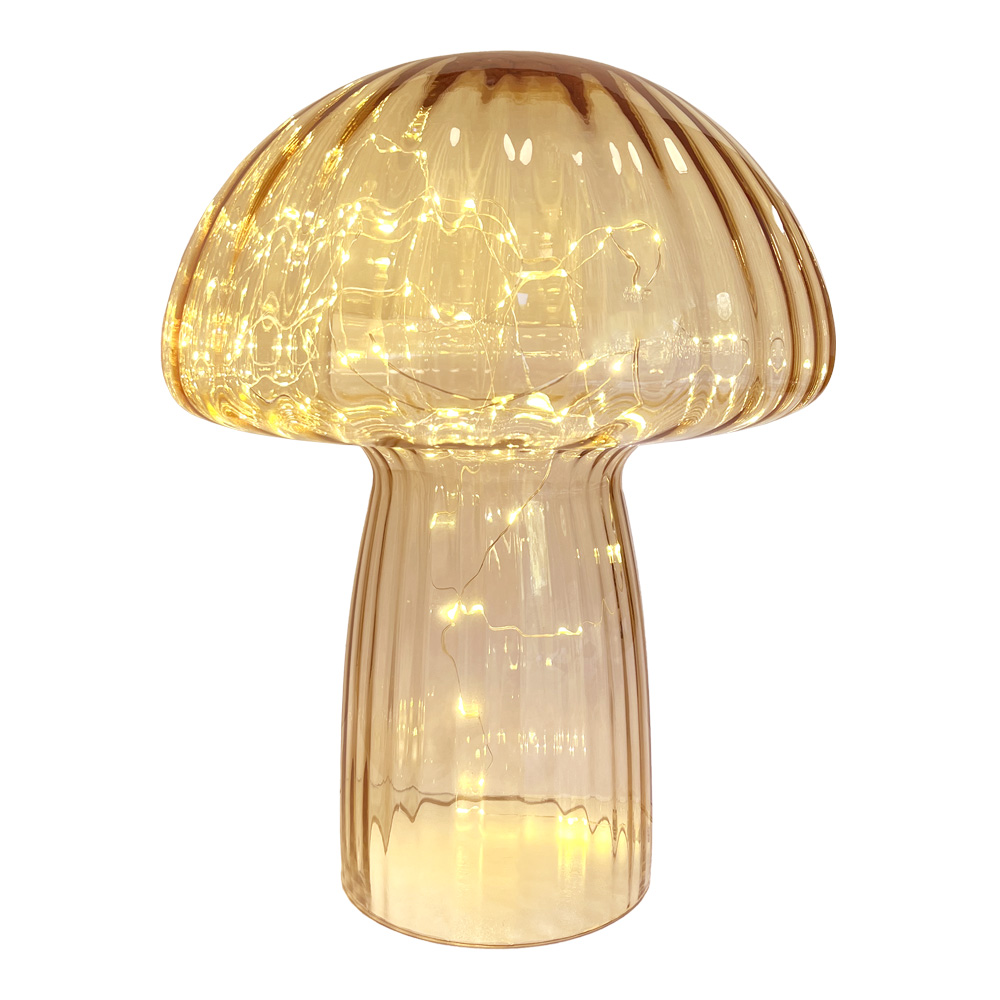 Mushroom 35cm Beige bordlampe Fra Pixie Design - Den er utstyrt med en timer og en praktisk 5-trinns dimmer for &aring; justere lyset etter behov, noe som gj&oslash;r den perfekt for b&aring;de arbeidsbelysning og koselig kveldsbelysning.