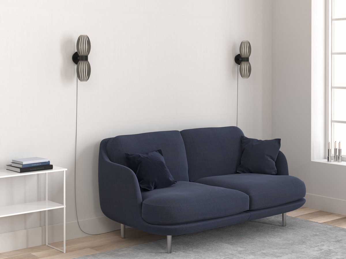 Tentacle Duo Svart vegglampe Fra Herstal - Den sorte skjermen med lameller skaper vakkert lys og gir en varm og innbydende atmosf&aelig;re.